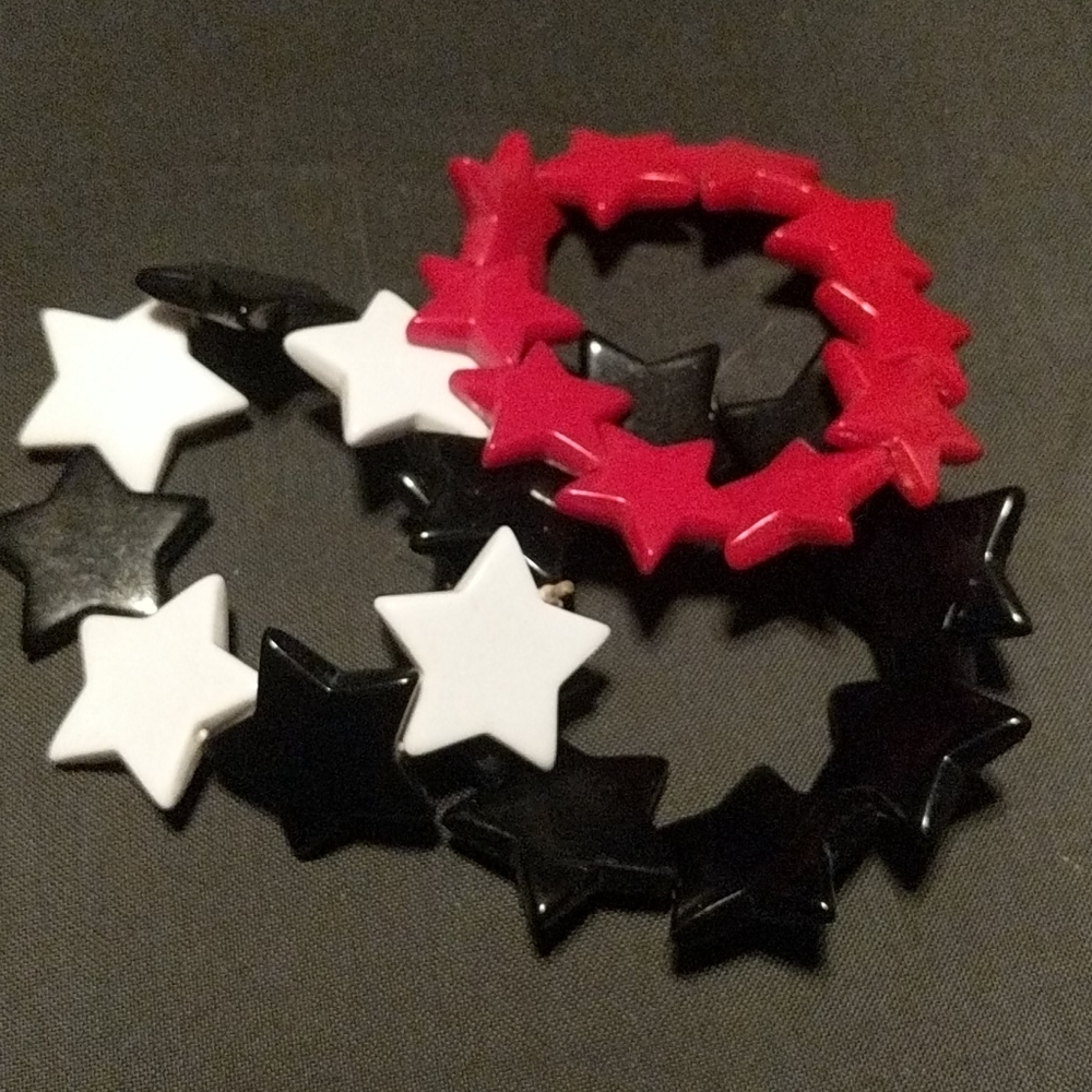 Lot of 3 plastic star bracelets Black, B&W & red